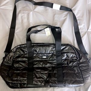 All black PINK duffel bag